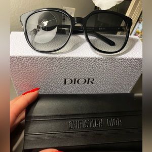 Christian Dior black sunglasses.